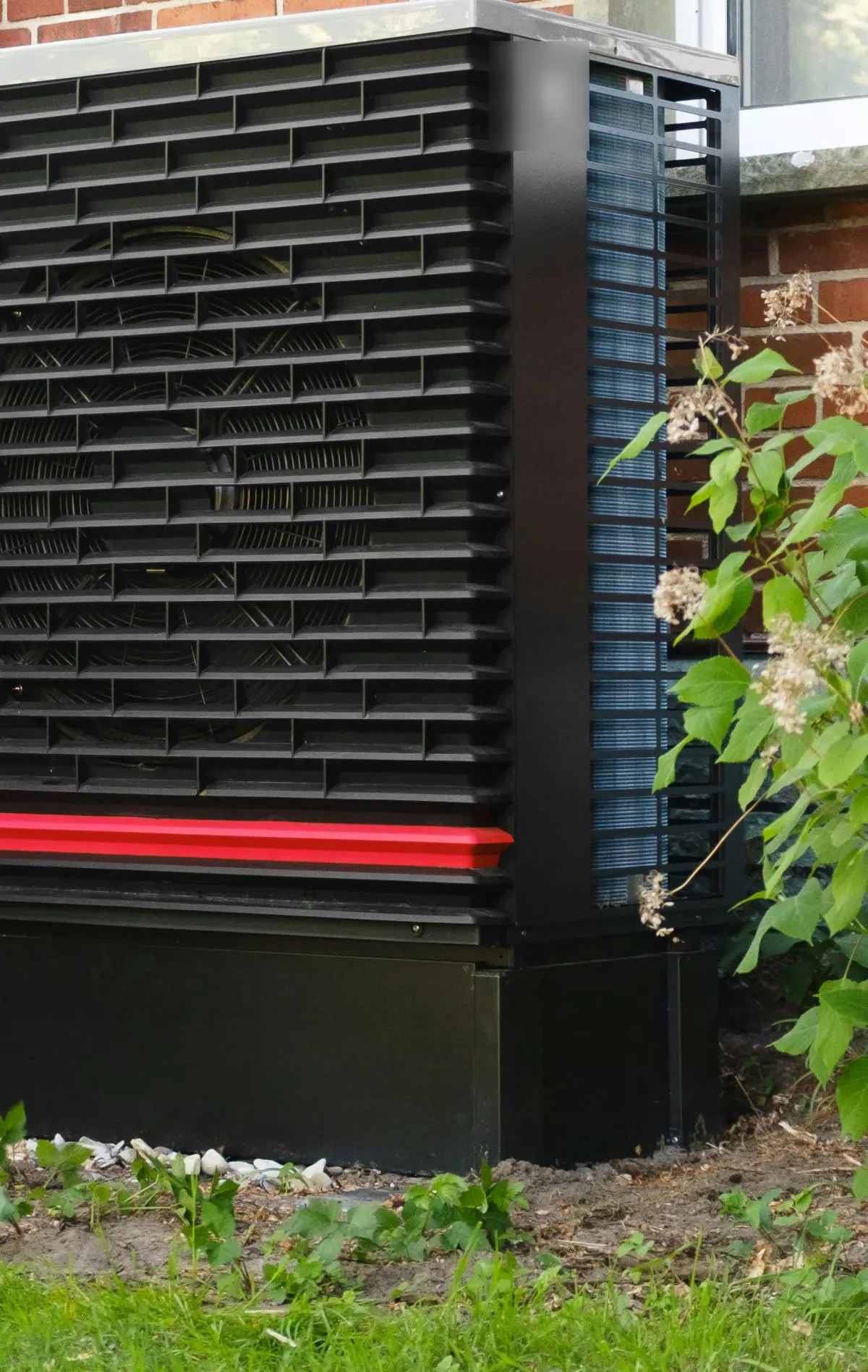 Close-up of a ductless heat pump outdoor unit's condenser coil