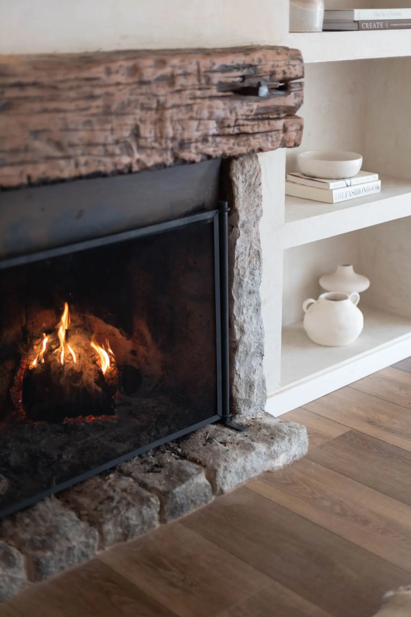 Cozy living room interior with a stone fireplace